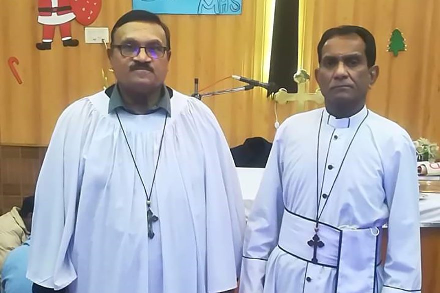 With picture of William Siraj (left) and Rev Patrick Naeem